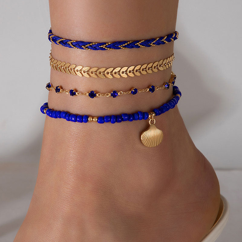 Lot de 4 bracelets de cheville bohèmes – Cordons tressés et perles noires