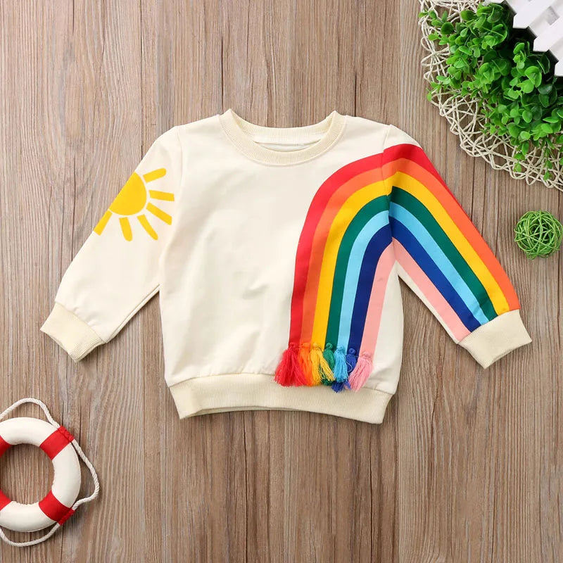 Sweat coloré bébé fille – Arc-en-ciel, chaleur et bonne humeur.