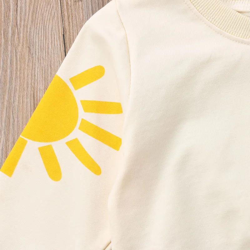 Sweat coloré bébé fille – Arc-en-ciel, chaleur et bonne humeur.
