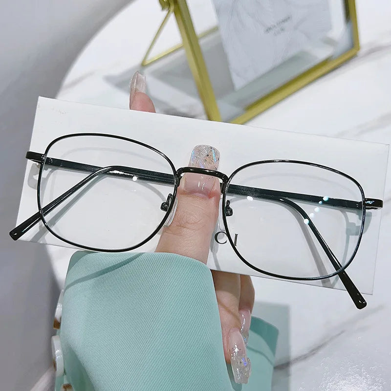 Lunettes photochromiques anti-lumière bleue – Monture métal, confort et style.