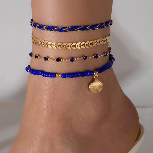 Lot de 4 bracelets de cheville bohèmes – Cordons tressés et perles noires
